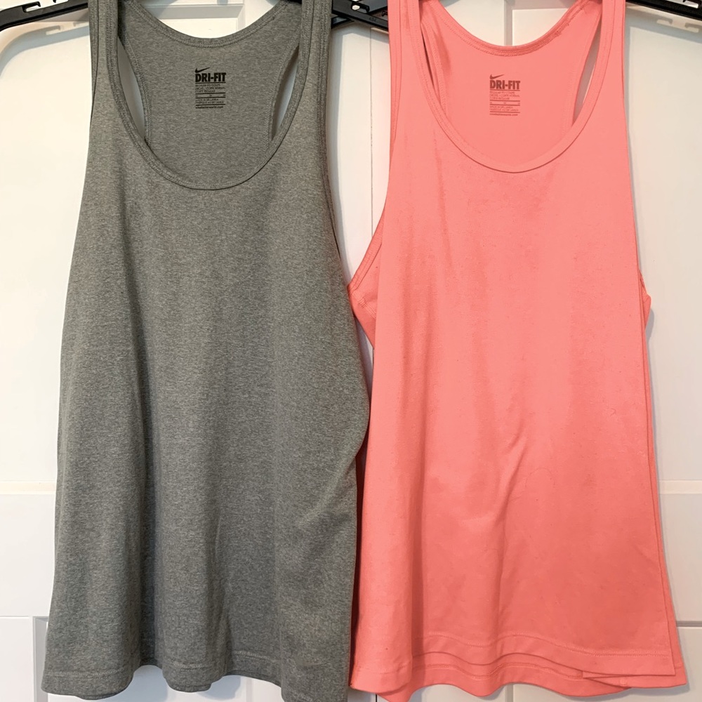 Nike workout tanks. Used-like new. Both size medium.